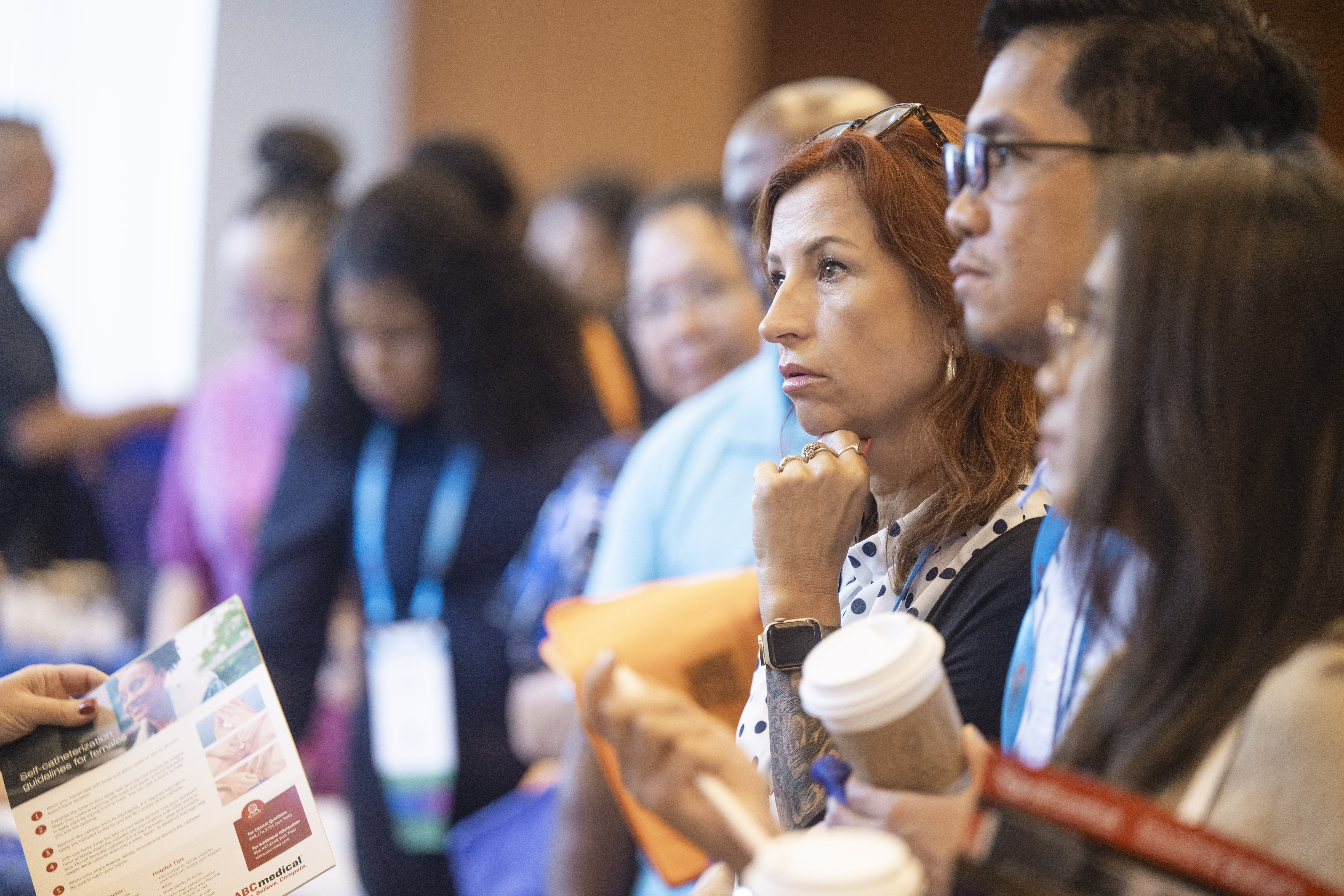 ARN Conference attendees in line at a booth